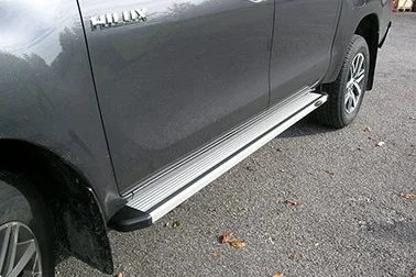 Estribos plataforma Aluminio STD HILUX REVO 2016- doble cabina